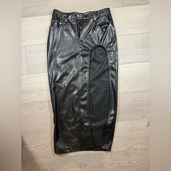 Salty Dresses & Skirts - SALTY Black Faux Leather SKIRT with leg cut out women size small stretchy trendy